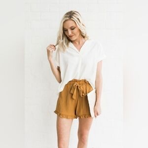 Mustard Seed Yellow Tie Front Ruffle Hem Shorts with Pockets